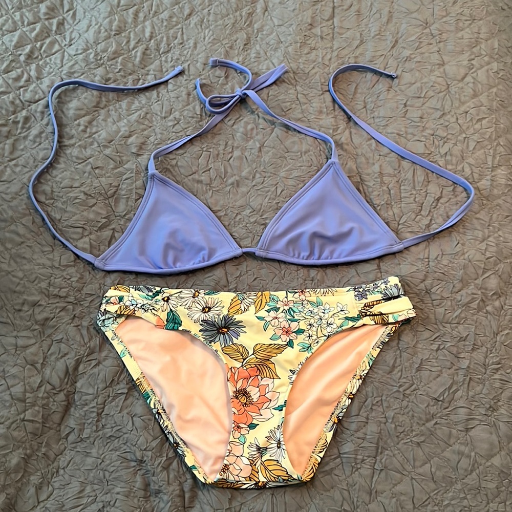Bikini 2 piece. Floral bottoms and lavender triangle top.
